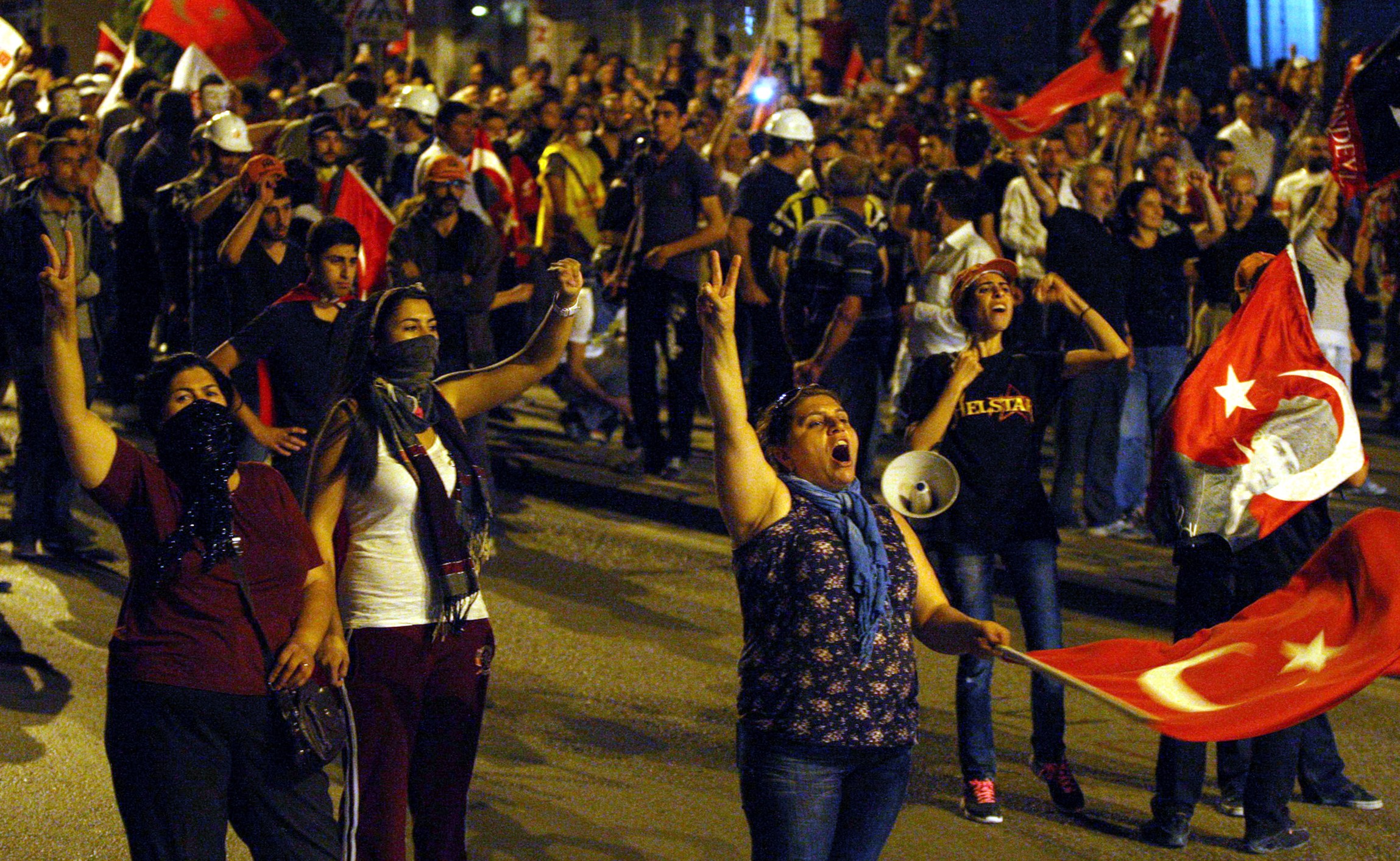 Protesters shout anti-government slogans during a demonstration in Ankara.  NTB / AFP photo / Adem Altan.