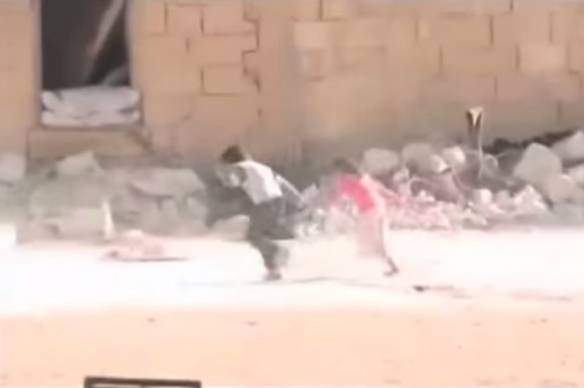 PRIO Blogs photo. Two children running through a ruined city.