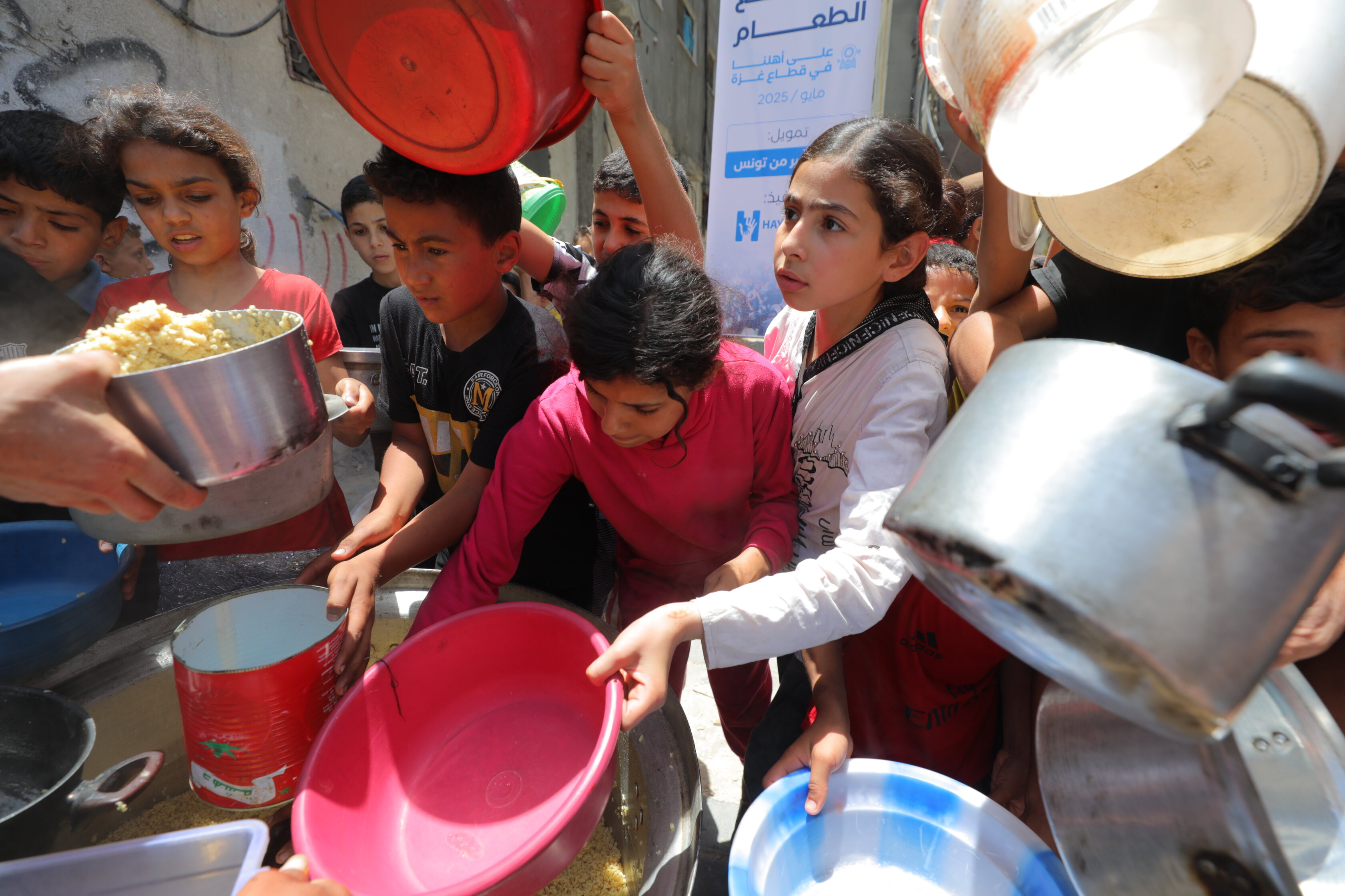 Palestinians deprived of basic necessities due to the ongoing Israeli blockade in Deir al Balah, Gaza on May 14, 2025. Photo: Hassan Jedi/Anadolu via Getty Images