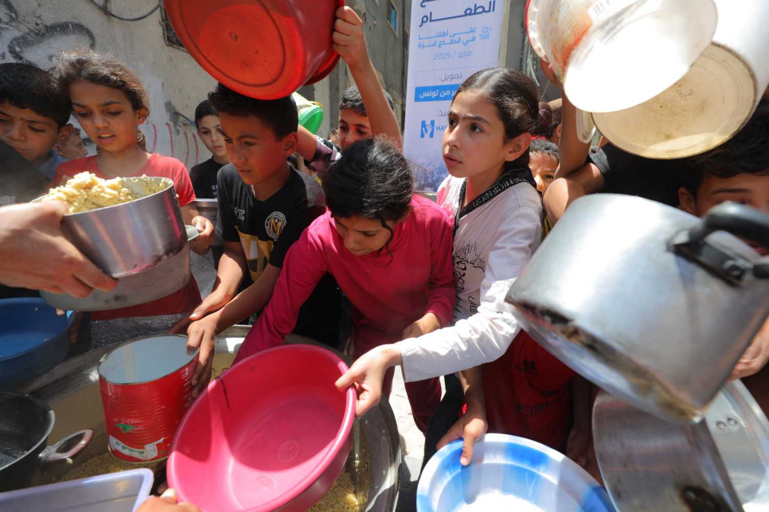 Palestinians deprived of basic necessities due to the ongoing Israeli blockade in Deir al Balah, Gaza on May 14, 2025. Photo: Hassan Jedi/Anadolu via Getty Images