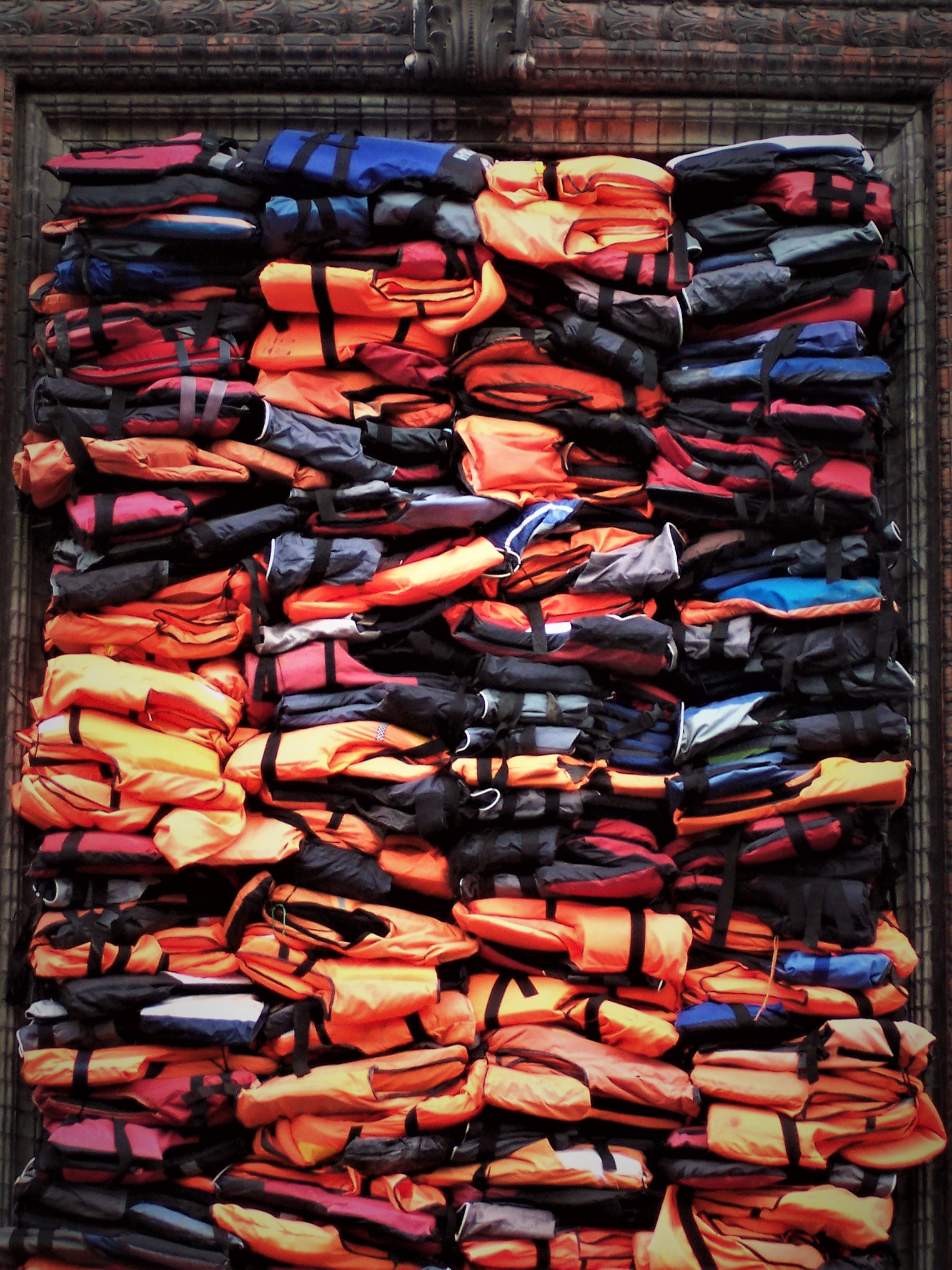 Ai Weiwei's Soleil Levant - migrants' lifejackets
This artwork in Copenhagen, by renowned Chinese artist and dissident Ai Weiwei, is made up of actual life jackets used by migrants crossing to the Greek island of Lesbos in search of safety or a better life in Europe. TeaMeister via Flickr