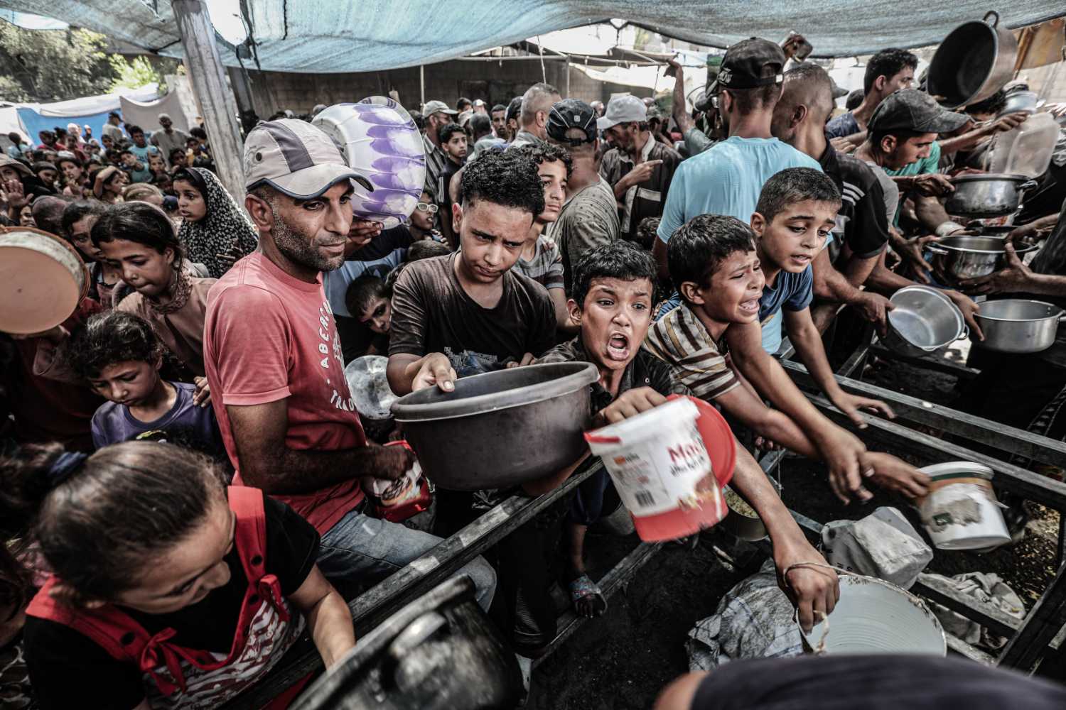 Palestinian civilians wait in line for hours for the distribution that could only serve a small number of people, in Nuseirat Refugee Camp, central Gaza, on September 01, 2025. . Photo: Moiz Salhi/Anadolu/Getty images