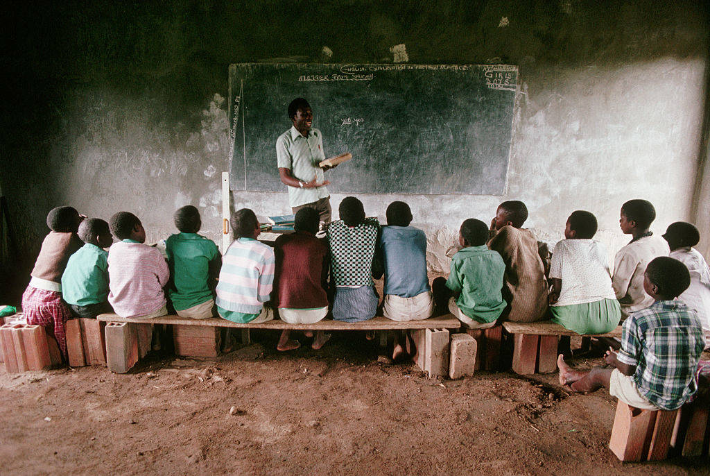 Teacher and students in Africa. Photo: Getty Images - do not reuse