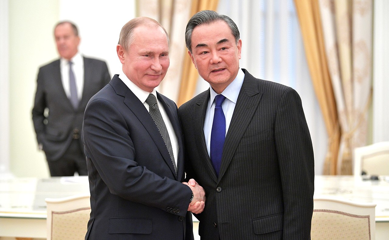 Chinese top diplomat Wang Yi with Vladimir Putin in 2018. Wikimedia Commons / kremlin.ru