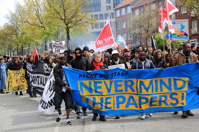 A Mayday protest in Hamburg, Germany, champions the slogan “Never Mind the Papers!,” in solidarity with the inbound refugees from Middle East conflicts, May 1, 2015. By Rasande Tyskar.