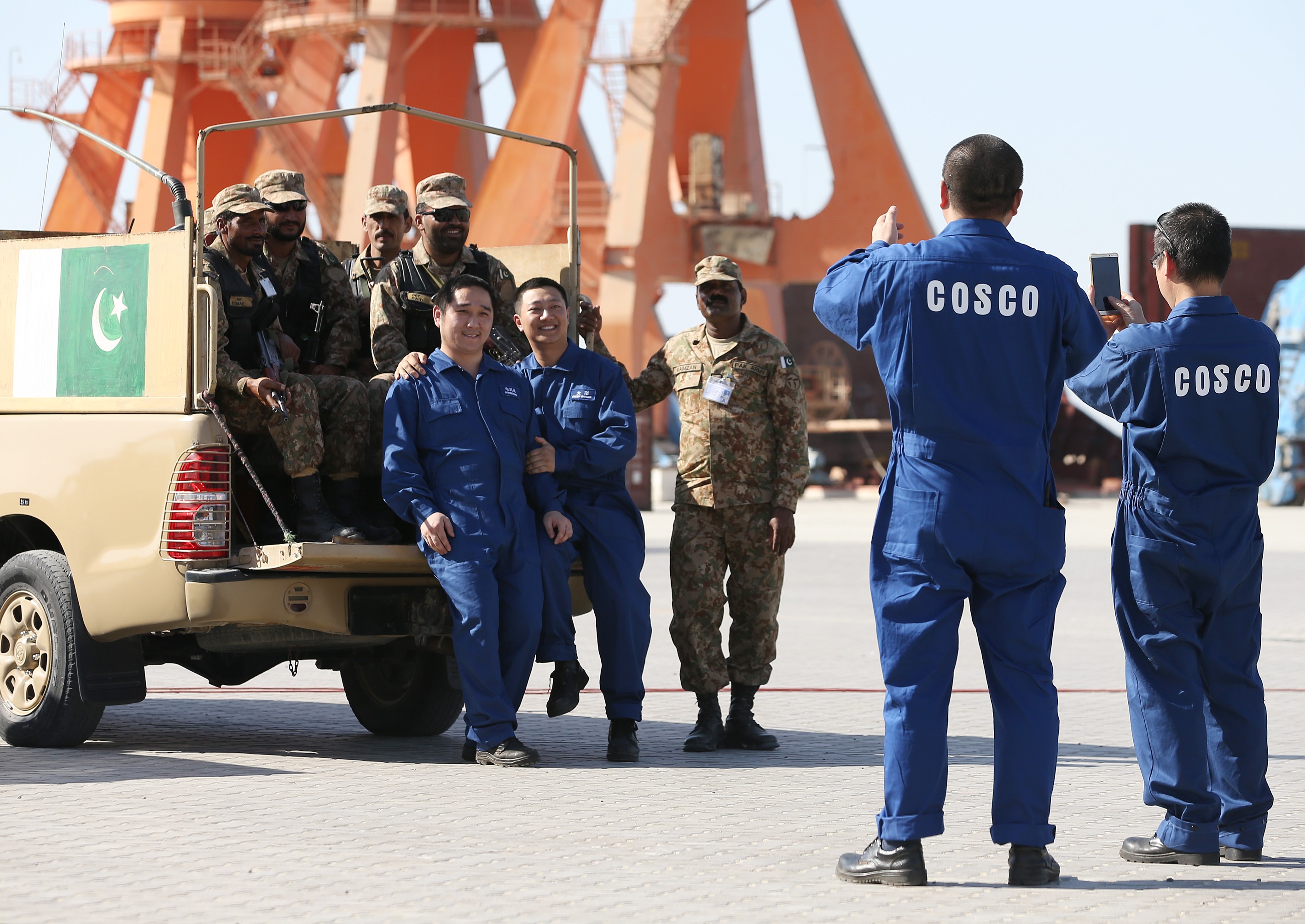Pakistani soldiers and Chinese staff during the opening of a trade project in Gwadar port, west of Karachi in 2016. This port was a key part of the China-Pakistan Economic Corridor (CPEC). Photo: Metin Aktas/Anadolu Agency/Getty Images