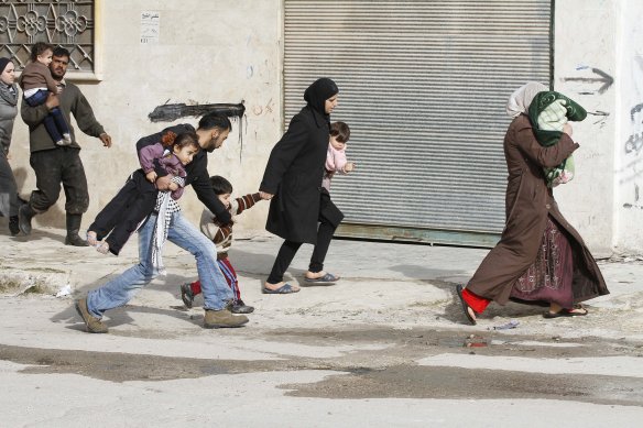 Civilians flee from fighting after Syrian army tanks entered the northwestern city of Idlib, Syria in 2012. Photo: Nasser Nouiri via Flickr. Photo: Nasser Nouiri via Flickr