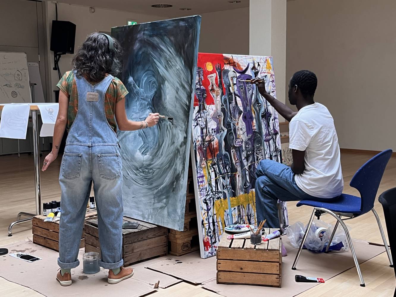 Diala Brisly and Khalid Shatta painting during Rotterdam Residency. Photo: Cindy Horst