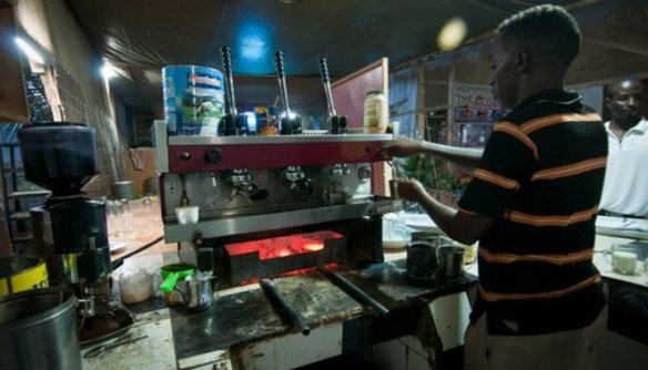 Living in a recovering failed state like Somalia means being innovative. At The Village Restaurant, a popular open-air hangout for Mogadishu’s returning diaspora community, a charcoal-powered Italian espresso machine brews Somalia’s best cappuccino. Photo: BBC