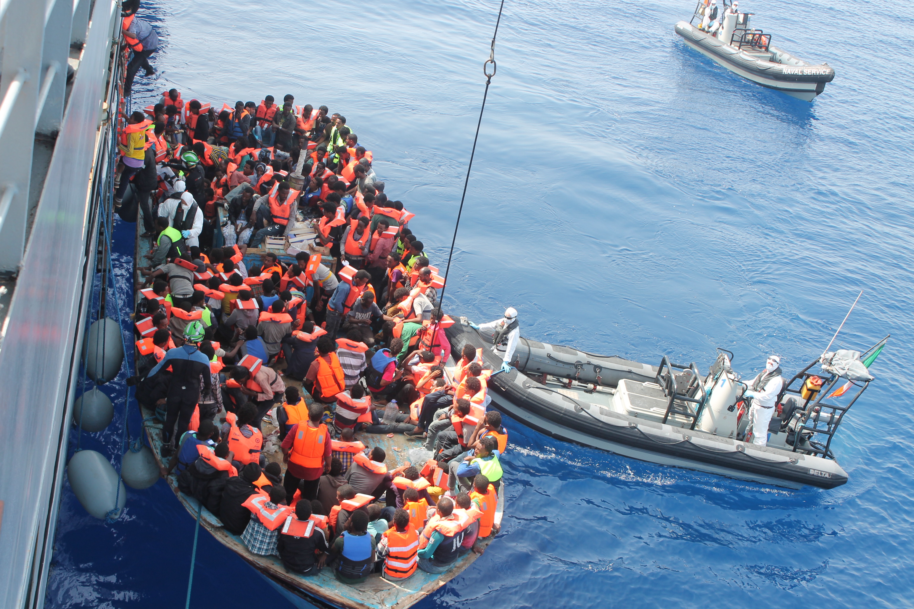 Irish Naval personnel from the LÉ Eithne (P31) rescuing migrants as part of Operation Triton. Photo: Irish Defence Forces, CC-BY
