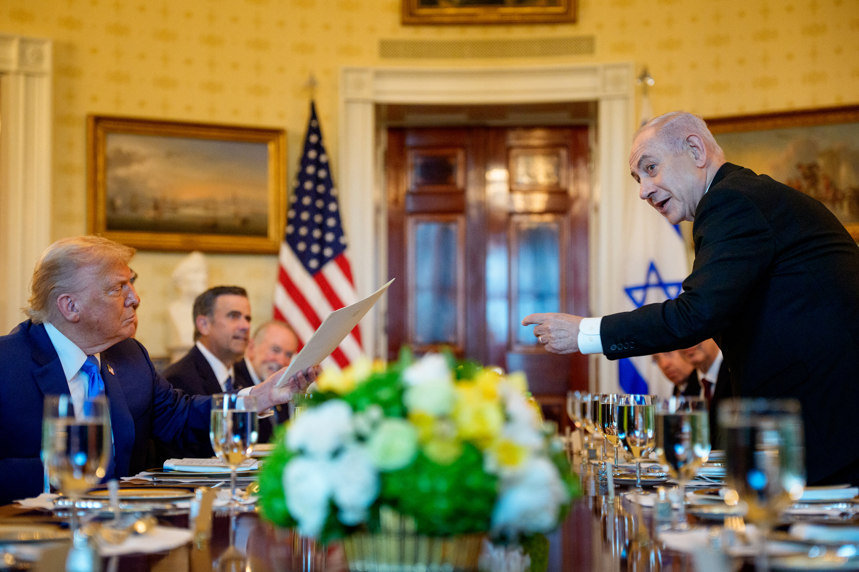 Benjamin Netanyahu hands off a letter Netanyahu sent to the Nobel Peace Prize committee to nominate U.S. President Donald Trump for the Nobel Peace Prize during a dinner in the Blue Room of the White House on July 07, 2025 in Washington, DC. Photo: Andrew Harnik/Getty Images