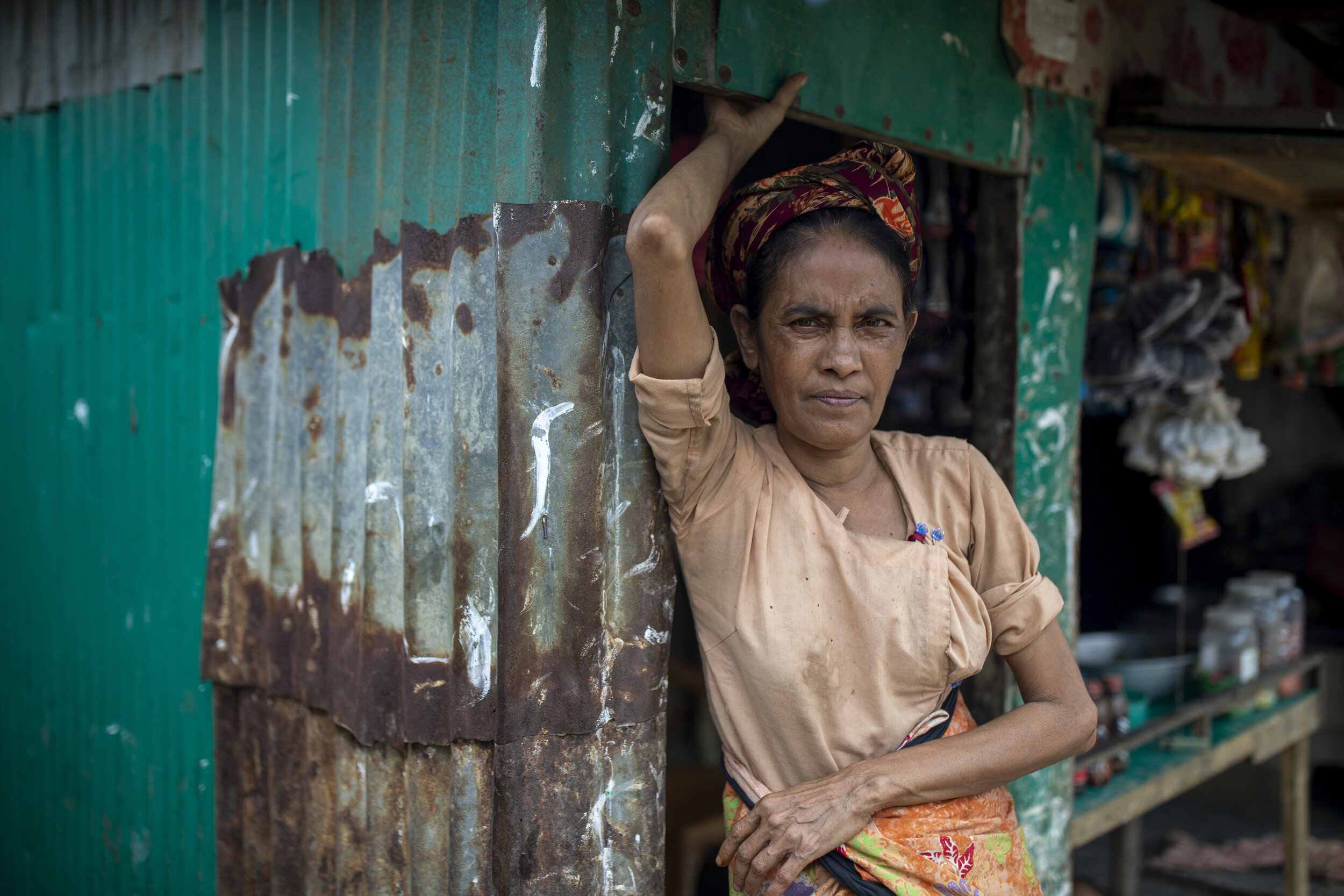 Rohingya refugee woman in front of her shop at Noya Para Rohingya refugee camp in Bangladesh in May 2023. Photo: K M Asad/LightRocket via Getty Images