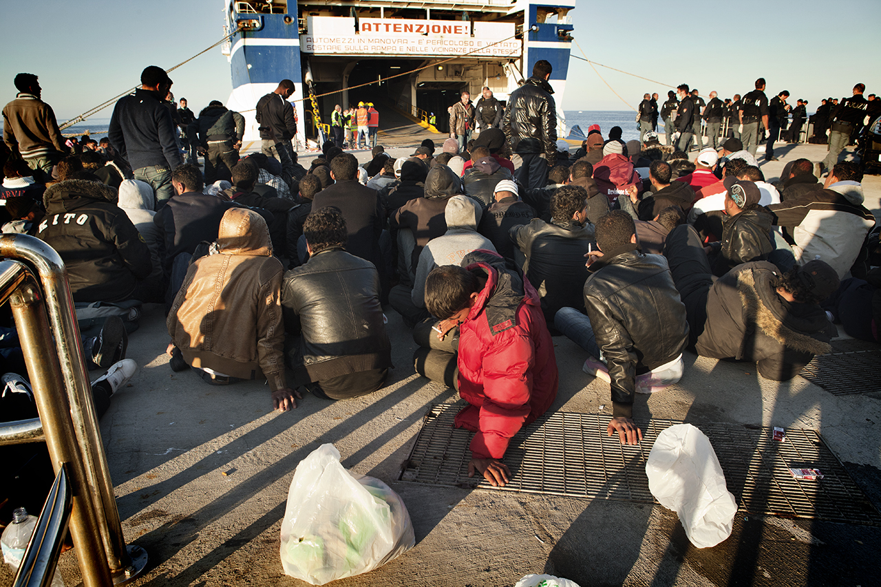 Embarkation of migrants, Cala Pisana, Lampedusa, (Matchbox Media Collective).