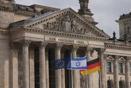 Israeli, EU and German flags outside the German parliament building. April 09, 2024. Photo: Sean Gallup/Getty Images