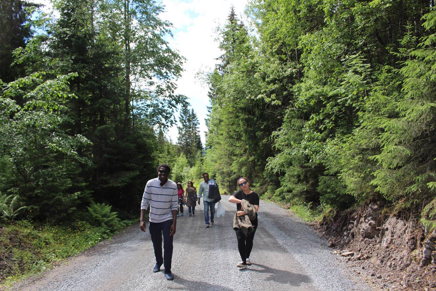 Students walk through the woods during the summer school cabin trip 2016. Photo: Adelaide Palmsiano