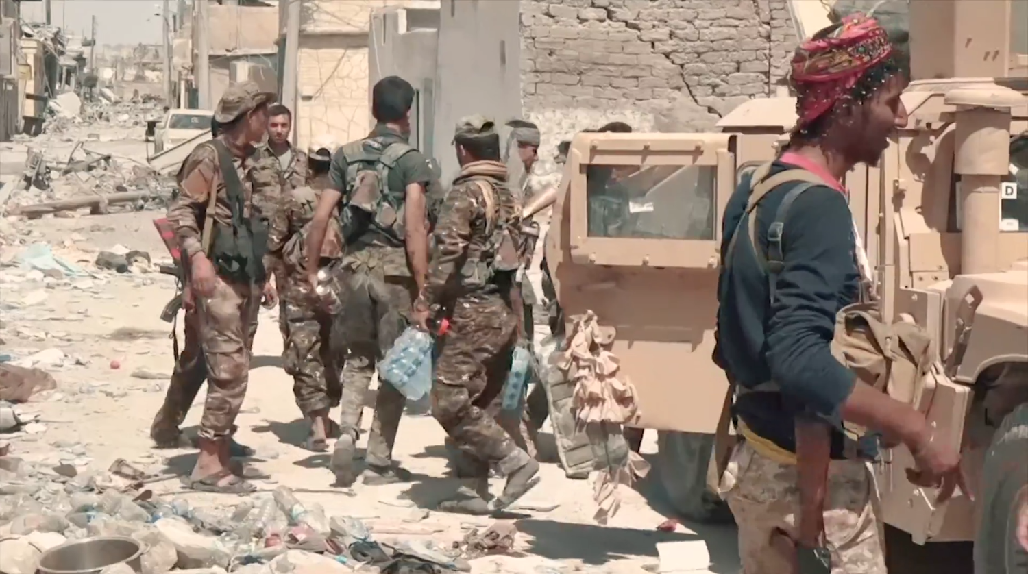 SDF fighters in central Raqqa in 2017. Mahmoud Bali. Wikimedia Commons / Public Domain