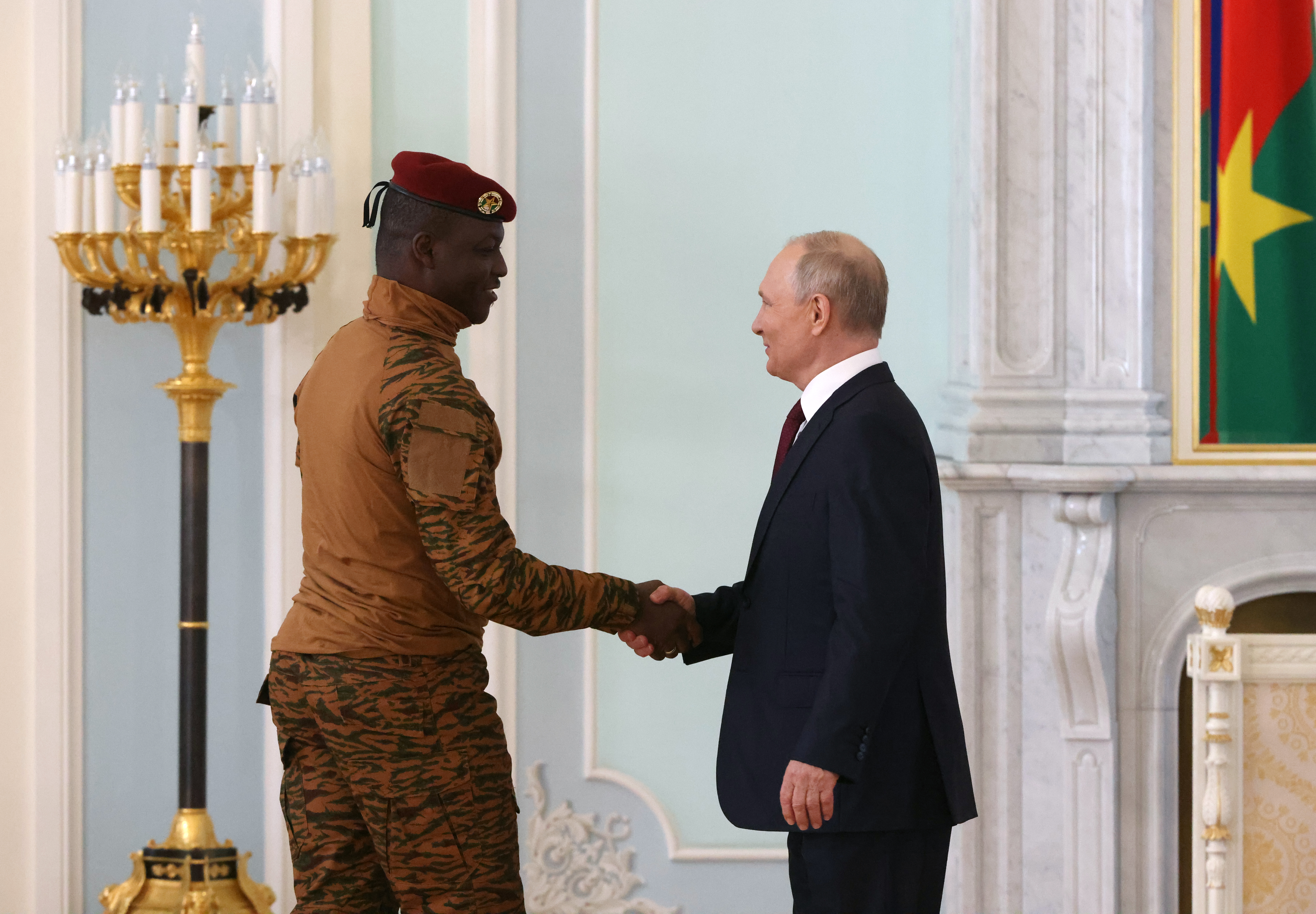 Putin greets Burkina Faso's President Ibrahim Traore during the Russia-Africa Summit in July 2023 in Saint Petersburg. Photo: Getty Images