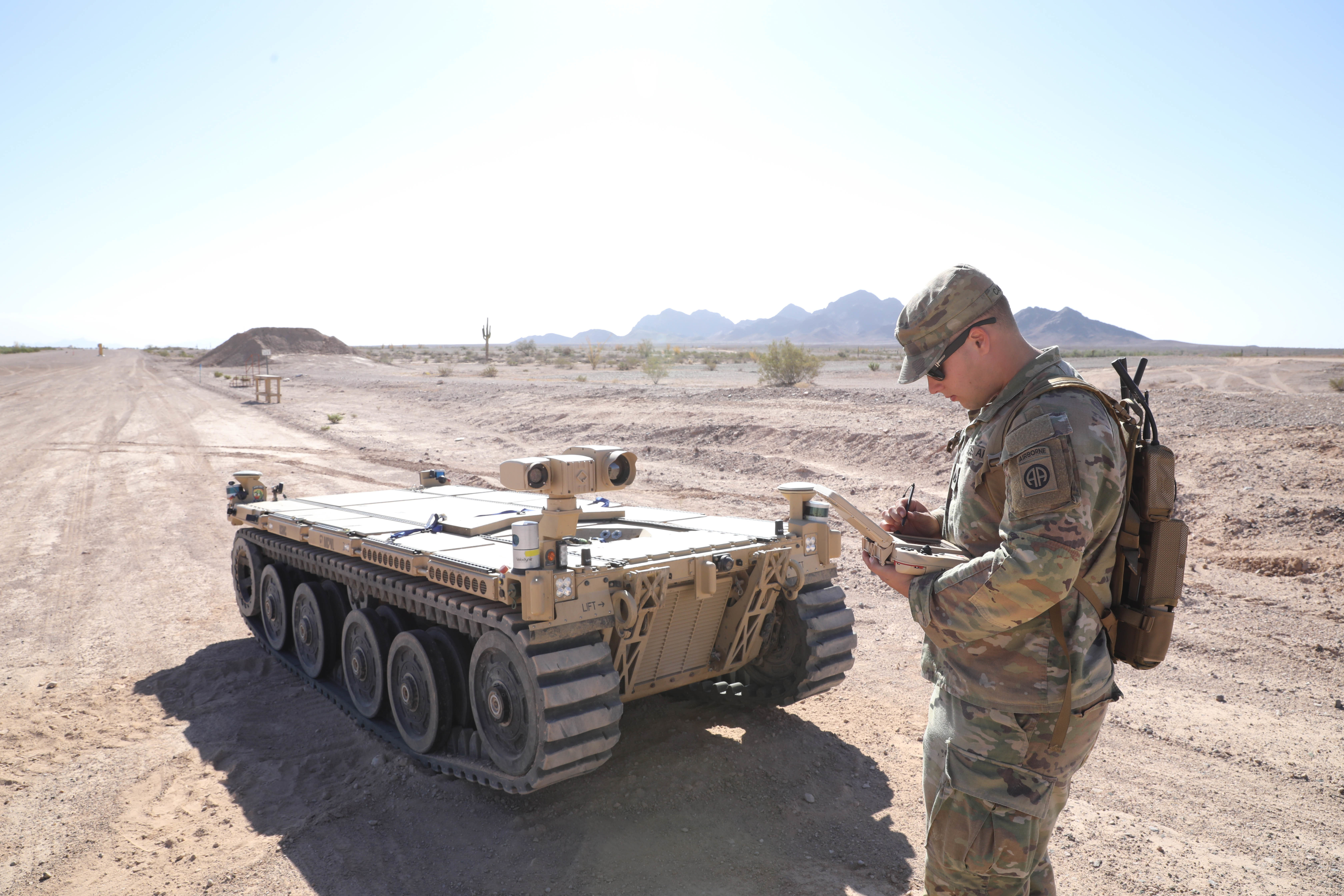 U.S. soldier uses the tactical robotic controller to control the expeditionary modular autonomous vehicle. 
U.S. Army photo by Sgt. Marita Schwab.