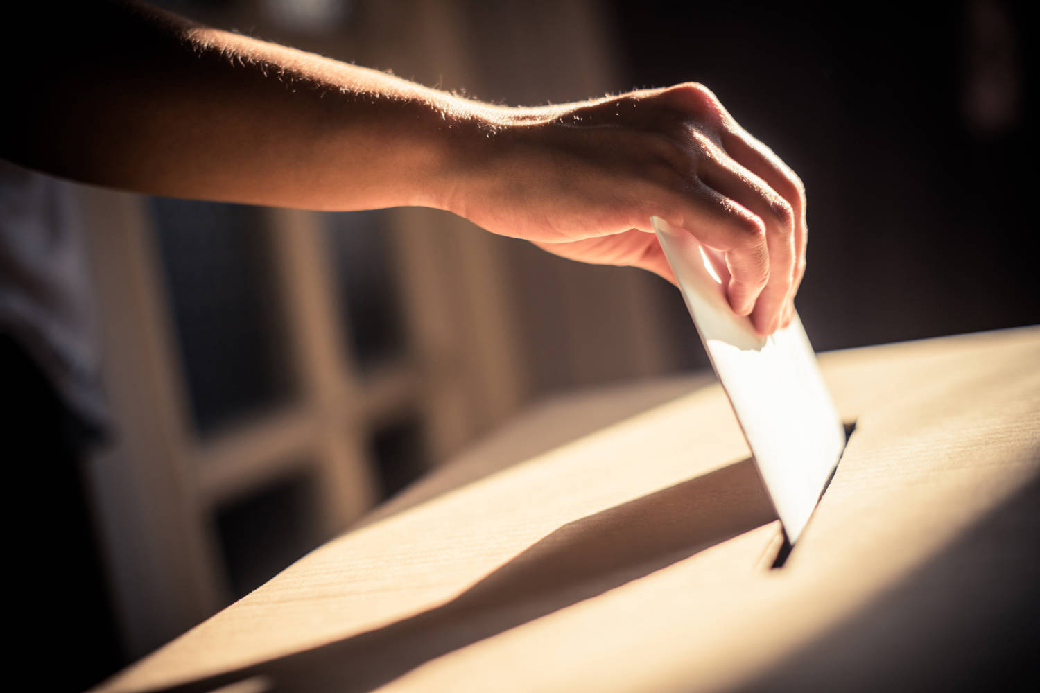 Casting a ballot at a polling station, during elections. Photo: Getty Images