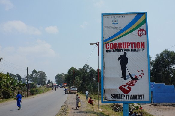 An anti-corruption billboard near the Rwanda-Uganda border crossing. Photo: Fred Inklaar via Flickr
