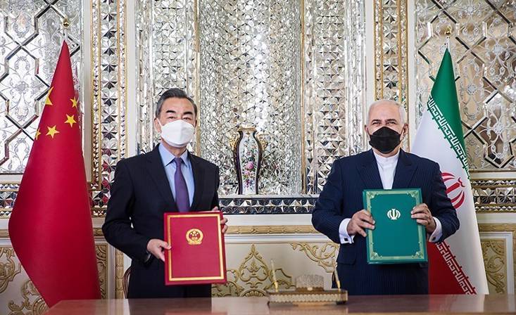 Iranian Foreign Minister Mohammad Javad Zarif and Chinese Foreign Minister Wang Yi signed a document on Iran–China 25-year Cooperation Program. Photo: Tasnim News Agency / CC BY 4.0