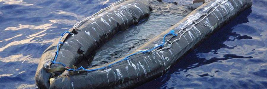 sinking dinghy in the Mediterranean Sea.