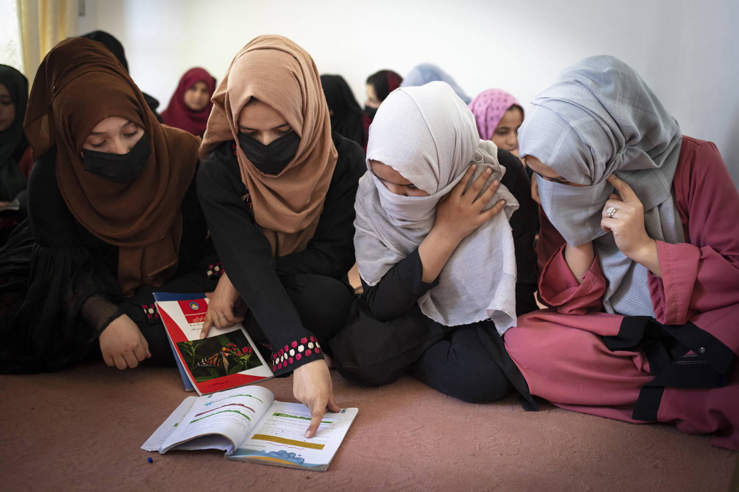 Masouda teaches around 20 young girls in a small room adjoining near her house in Kabul, Afghanistan. Photo: Getty Images