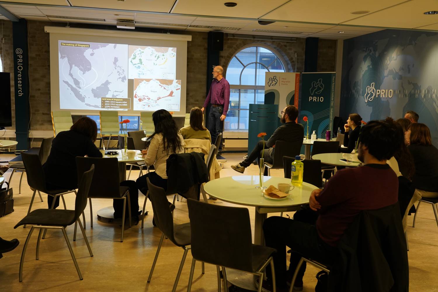 Presenting on stage: Professor Jonathan Rigg. Photo: PRIO / Angelica Estevez