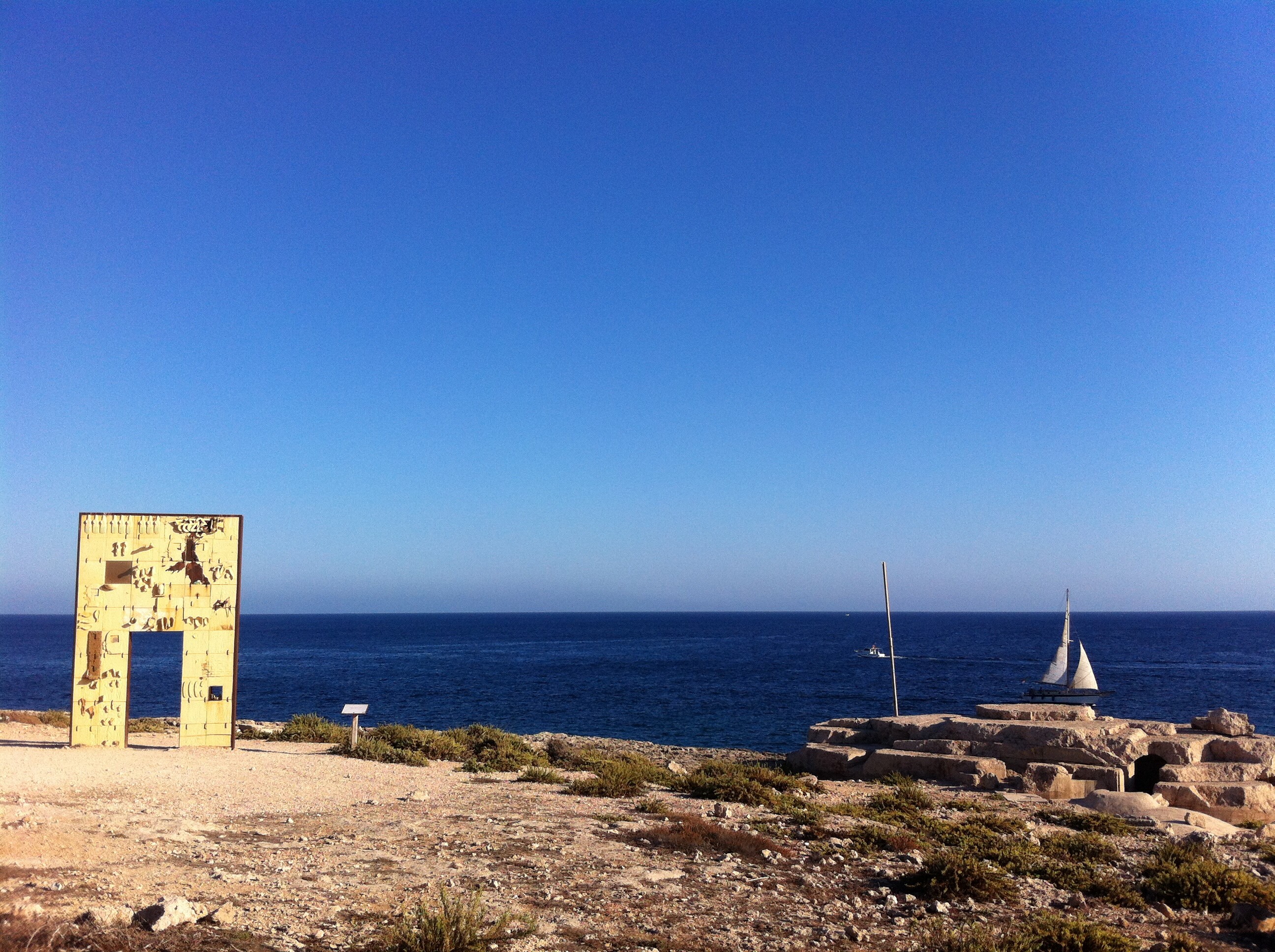“Gate to Lampedusa - Gate to Europe.” A monument dedicated the migrants lost at sea, by Mimmo Paladino. Photo by Vito Manzari, 2014. Wikimedia Commons.