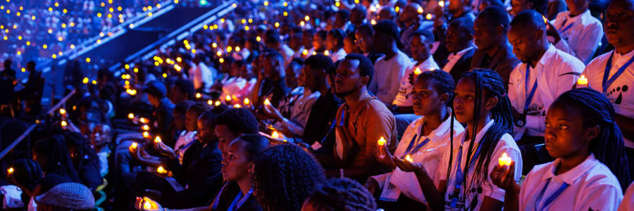 Young Rwandans take part in a candle lit vigil on the first of 100 days of remembrance as Rwanda commemorates the 30th anniversary of the Tutsi genocide on April 7, 2024 in Kigali, Rwanda. Photo: Luke Dray / Getty Images
