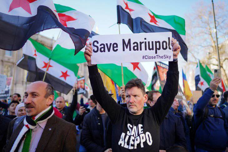 Photo: Syrian protesters assemble in solidarity with Ukrainians under Russian attack. Photo: Alisdare Hickson via Flickr. CC BY-SA 2.0
