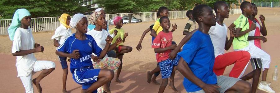 Girls and boys train and play sports together in Niger. Association Sportive Les Volcans via Flickr CC